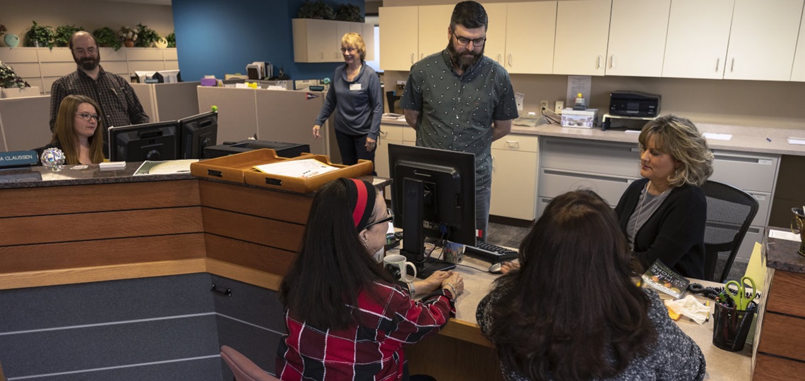 City Clerk's Office Front Desk with People