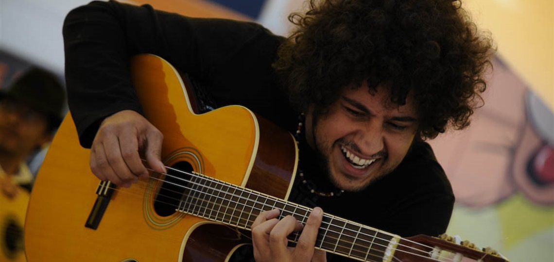 Diego Figueiredo plays his guitar. 