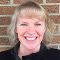 A portrait of Andrea Peltier, Reiki therapist.