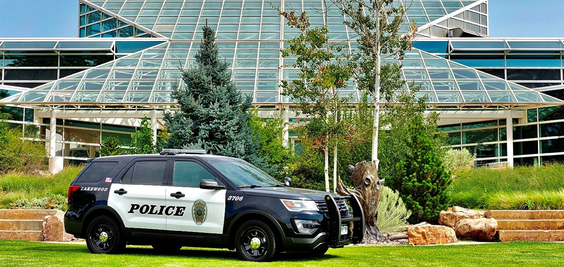 patrol car in front of building